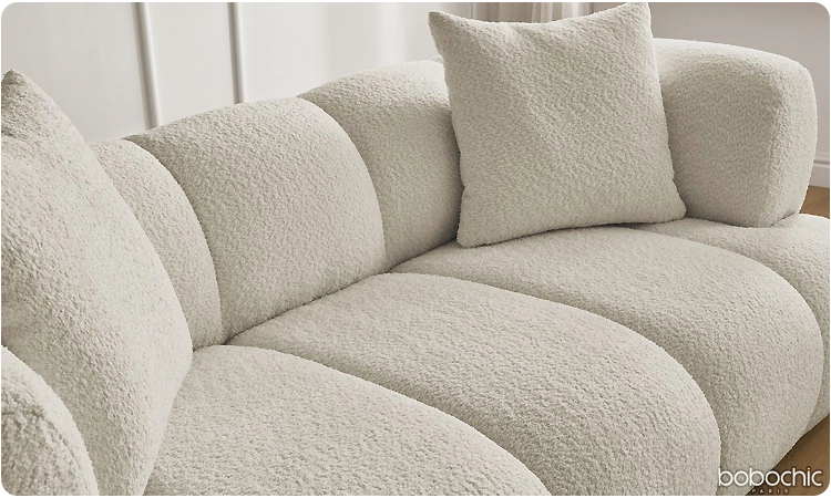 Canapé en tissu bouclette beige