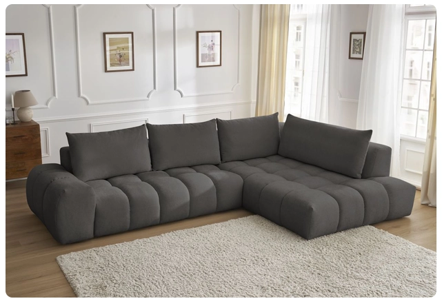 Comment décorer un salon avec un canapé gris foncé ?