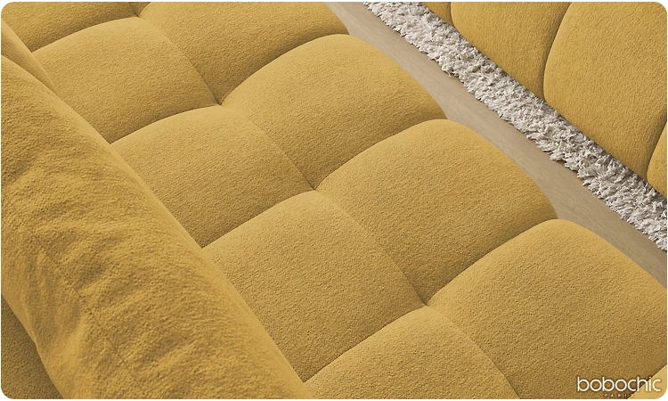Canapé jaune avec un tissu texturé